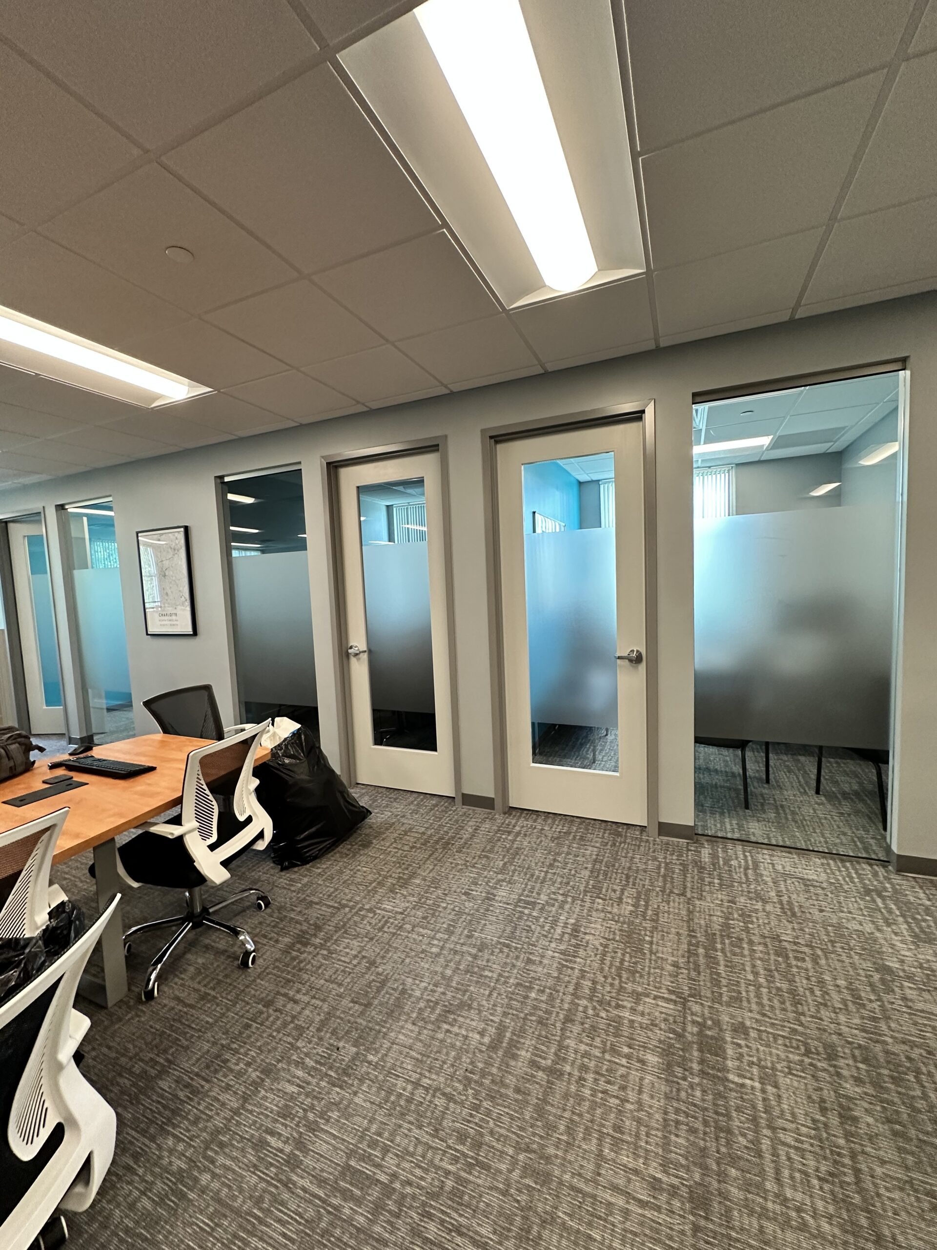 Dusted crystal frosted film on office glass partitions in Doral